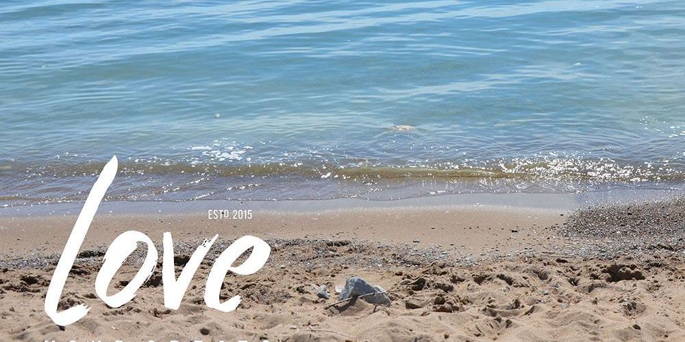  A photo of Lake Huron with Love Your Greats wordmark logo superimposed.